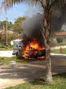 Postal truck catches fire in Edgewater, FL.